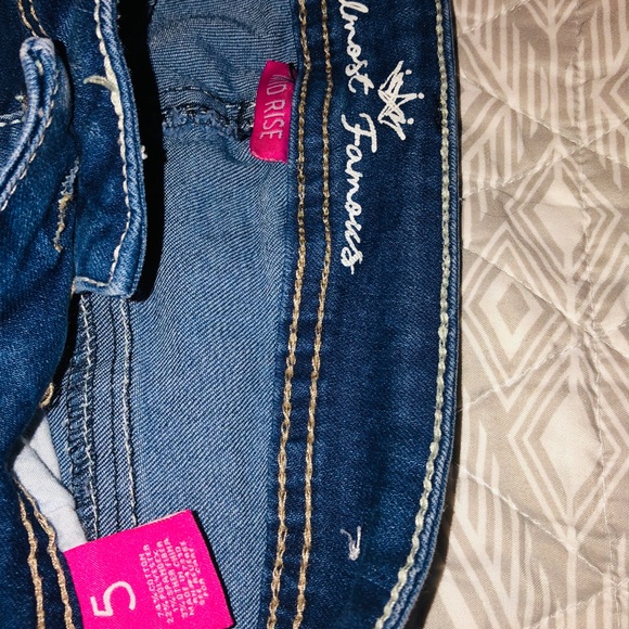 Mid Rise Ripped Jeans - Picture 2 of 3